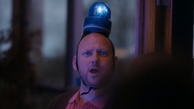 Video Reference N8: Face, Blue, Head, Light, Purple, Human, Fun, Headgear, Night, Electric blue, Person, Indoor, Wearing, Looking, Young, Man, Front, Boy, Holding, Shirt, Table, Standing, Little, Camera, Sitting, Hat, Smiling, Cake, Food, Computer, White, Room, Red, Pizza, Human face, Clothing, Fashion accessory, Staring