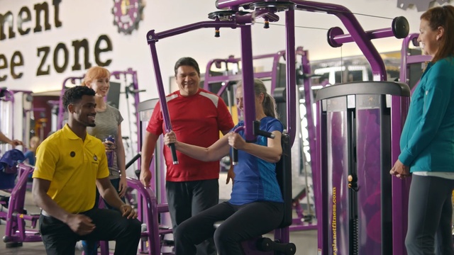 Video Reference N1: gym, structure, room, purple, physical fitness, sport venue, physical exercise, recreation, personal trainer, Person