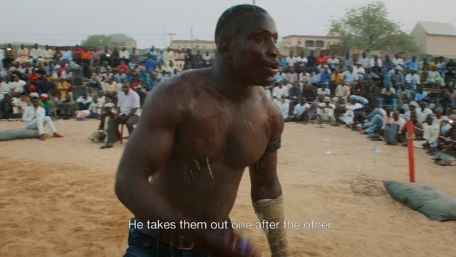 Video Reference N4: man, folk wrestling, barechestedness, pradal serey, muscle, mud, material, chest