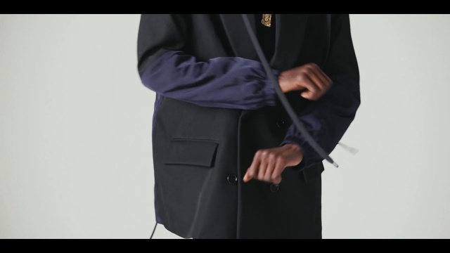 Video Reference N1: Clothing, Formal wear, Outerwear, Coat, Jacket, Suit, Fashion, Sleeve, Dress, Trousers