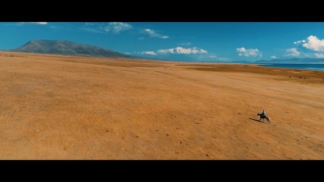 Video Reference N1: sky, ecosystem, horizon, cloud, plain, steppe, ecoregion, hill, grassland, sand