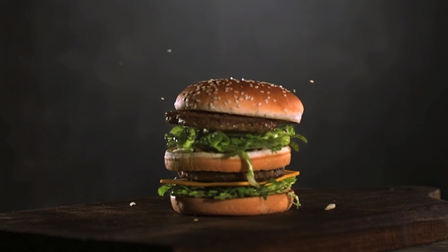 Video Reference N3: hamburger, veggie burger, fast food, sandwich, finger food, food, cheeseburger, big mac, salmon burger, breakfast sandwich