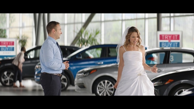 Video Reference N5: Luxury vehicle, Photograph, Automotive design, Car, Vehicle, Snapshot, Car dealership, Male, Dress, Person