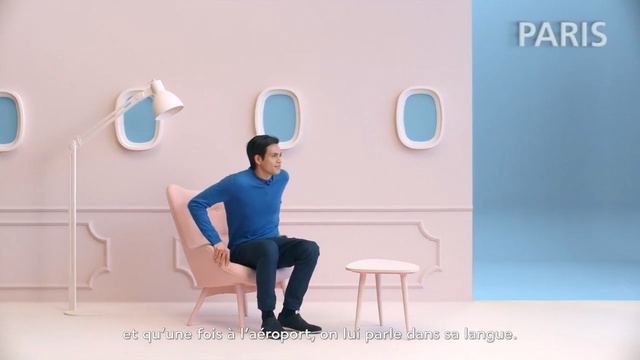 Video Reference N3: blue, sitting, furniture, table, shoulder, chair, girl, flooring, Person