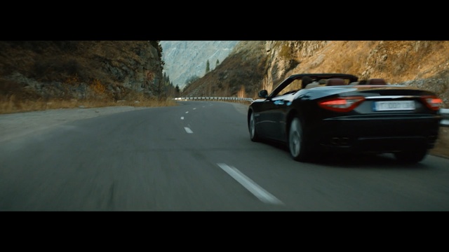 Video Reference N1: car, road, sports car, vehicle, automotive design, mode of transport, performance car, personal luxury car, supercar, road trip