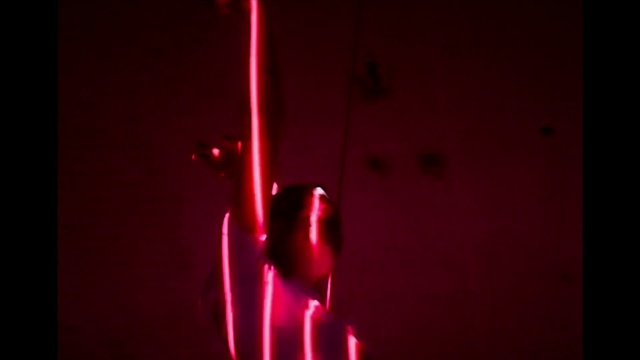 Video Reference N5: Red, Light, Performing arts, Aerialist, Dance, Performance, Still life photography, Event, Photography, Magenta