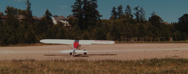 Video Reference N2: aircraft, airplane, sky, light aircraft, aviation, flight, wing, air travel, field, ultralight aviation