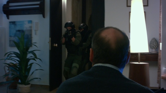 Video Reference N0: swat, rush, opening door, open door, office, man, bald spot, lamp, room, police