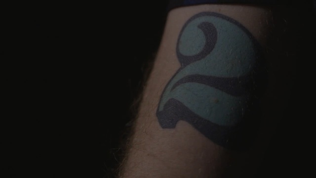Video Reference N0: blue, black, close up, arm, darkness, tattoo, eye, joint, hand, mouth