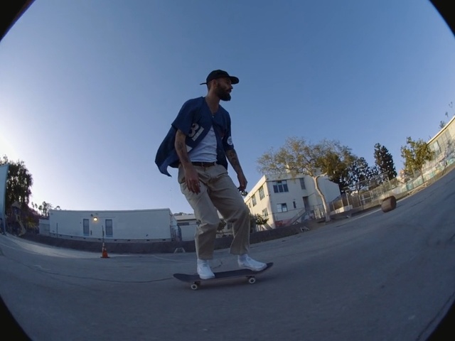 Video Reference N17: Skateboarding, Kickflip, Fisheye lens, Photography, Skateboarder, Freebord, Recreation, Boardsport, Skateboard, Sky, Outdoor, Road, Man, Board, Riding, Jumping, Trick, Young, Doing, Air, Boy, Ramp, Park, Shirt, Street, Holding, Hat, White, Standing, Mirror, Skating, Sports equipment, Footwear, Person, Skateboarding equipment, Snowboarding, Longboarding, Clothing, Individual sports, Longboard, Male, Highway