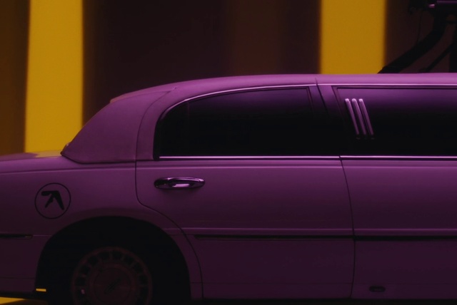 Video Reference N0: Land vehicle, Car, Luxury vehicle, Vehicle, Pink, Full-size car, Purple, Yellow, Limousine, Vehicle door