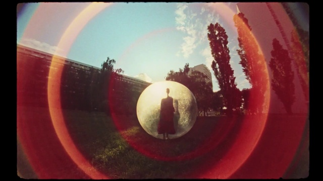 Video Reference N3: Sky, World, Mirror, Automotive lighting, Circle, Tints and shades, Tree, Art, Lens flare, Reflection