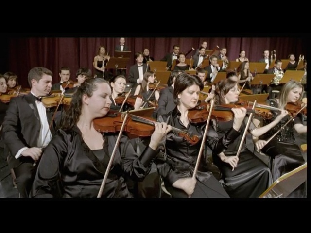 Video Reference N5: Orchestra, Music, Classical music, Musician, Musical ensemble, Musical instrument, Concertmaster, Violin, Event, Viol, Person