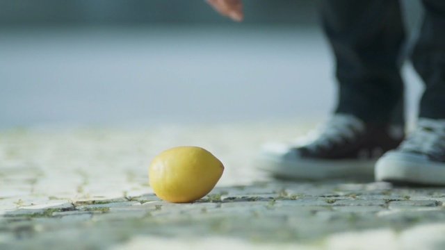 Video Reference N2: yellow, photography, foot, hand, tennis ball, shoe, sky, ball, recreation