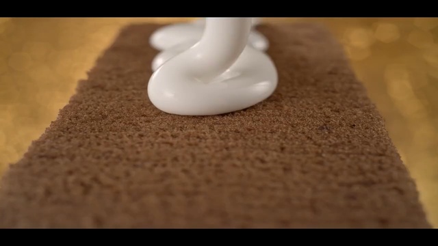 Video Reference N0: flooring, icing, baking, buttercream, floor, material, Person