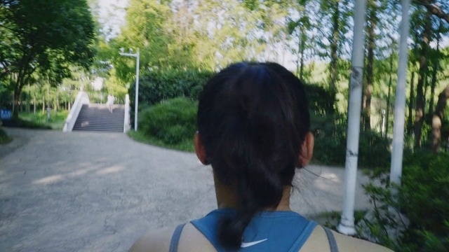 Video Reference N5: hair, blue, tree, photograph, green, woody plant, plant, vertebrate, girl, hairstyle