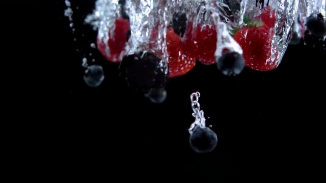 Video Reference N4: Red, Water, Macro photography, Icicle, Fashion accessory, Photography, Ice, Jewellery, Fruit, Table, Sitting, Black, Snow, Covered, Food, Glass, Holding, Man, White