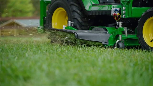 Video Reference N1: Lawn, Grass, Vehicle, Green, Mower, Lawn mower, Grassland, Outdoor power equipment, Plant, Automotive wheel system