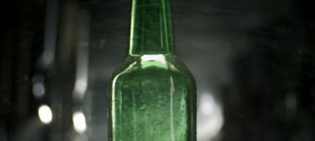 Video Reference N1: Bottle, Glass bottle, Green, Beer bottle, Alcohol, Liqueur, Drink, Wine bottle, Drinkware, Glass