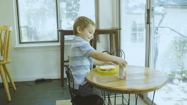Video Reference N1: Child, Table, Room, Toddler, Furniture, Home, Window, Vacation, Breakfast, Sitting, Person