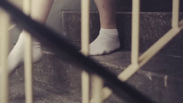 Video Reference N3: Leg, Snapshot, Line, Human leg, Shoe, Foot, Person, Building, Woman, Photo, Holding, Sitting, Umbrella, Front, Standing, Black, Girl, White, Rain, Man, Young, Street, Cat, Footwear, Feet, Clothing