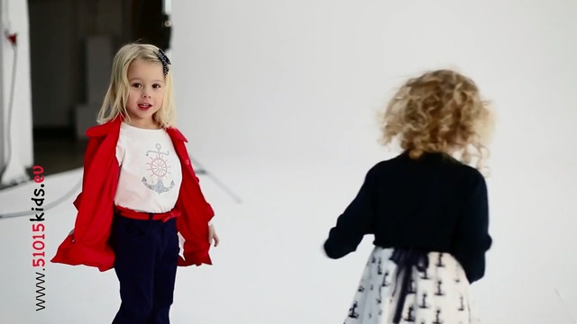 Video Reference N1: White, Black, Red, Clothing, Outerwear, Fashion, Child, Shoulder, Toddler, Standing, Person
