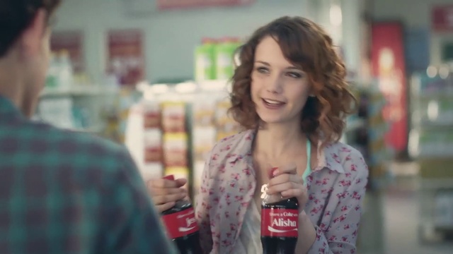 Video Reference N9: Coca-cola, Cola, Lip, Smile, Carbonated soft drinks, Drink, Soft drink, Brown hair, Long hair