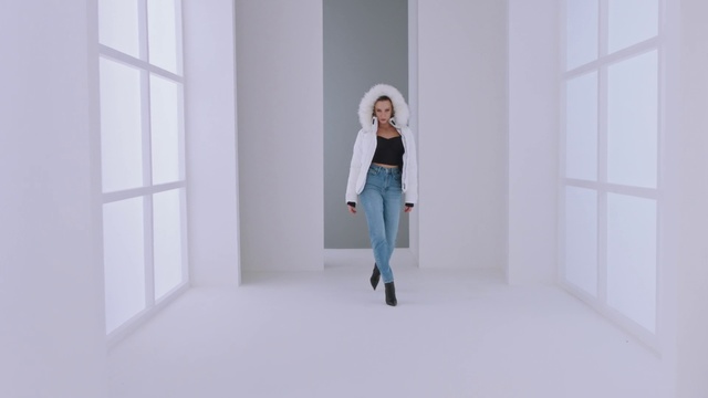 Video Reference N5: White, Clothing, Shoulder, Blue, Fashion, Standing, Outerwear, Joint, Footwear, Waist