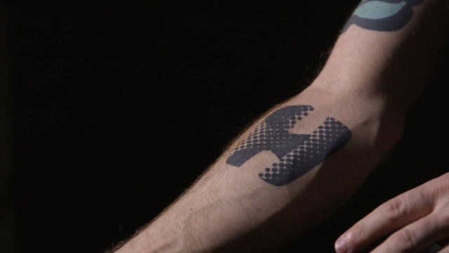 Video Reference N8: joint, finger, temporary tattoo, tattoo, arm, hand, bandage, nail, font, human leg