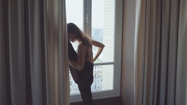Video Reference N2: window, shoulder, girl, light, leg, curtain, human body, joint, textile, arm, Person