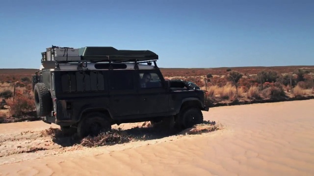 Video Reference N1: Off-road vehicle, Vehicle, Mode of transport, Natural environment, Car, Off-roading, Land rover defender, Landscape, Automotive tire, Automotive exterior