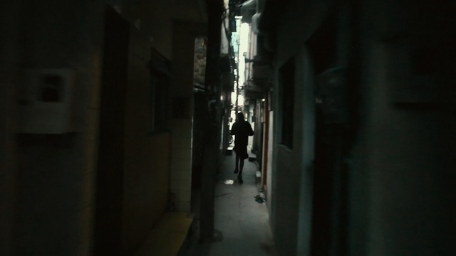 Video Reference N1: Alley, White, Black, Street, Darkness, Road, Light, Infrastructure, Snapshot, Town, Person