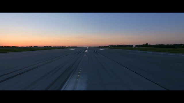 Video Reference N2: Sky, Horizon, Runway, Road, Morning, Evening, Dusk, Cloud, Infrastructure, Line