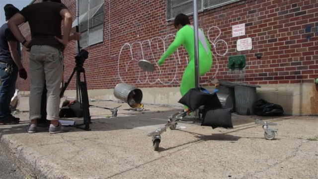 Video Reference N2: Flooring, Sidewalk, Asphalt, Floor, Cobblestone, Road surface, Concrete, Person