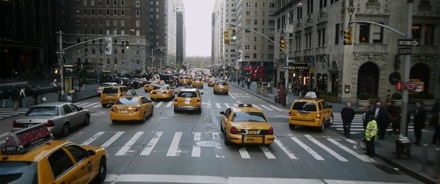 Video Reference N2: Taxi, Vehicle, Thoroughfare, Traffic, Metropolitan area, Mode of transport, Motor vehicle, Yellow, Metropolis, Urban area, Person