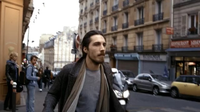 Video Reference N1: street, road, city, pedestrian, building, vehicle, car, family car, facial hair, Person