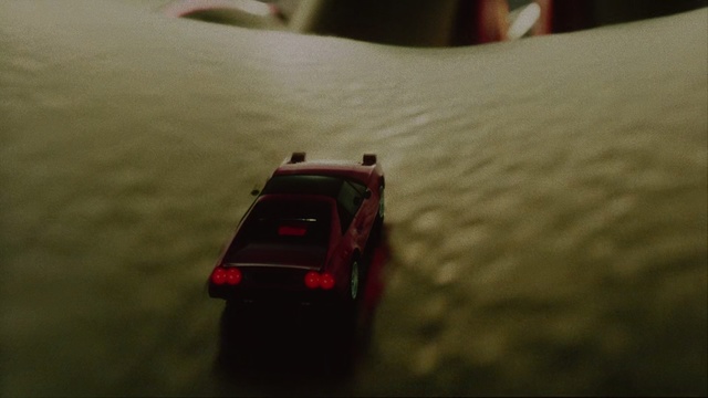 Video Reference N1: Red, Vehicle, Car, Model car, Scale model, Mode of transport, Toy vehicle, Automotive design, Toy, Road