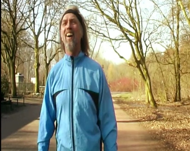Video Reference N1: clothing, blue, tree, green, photograph, jacket, facial expression, person, man, day