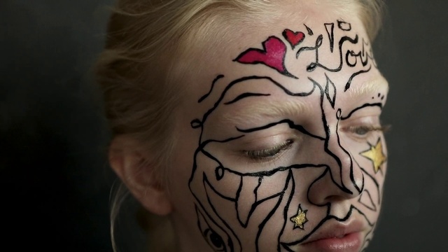 Video Reference N4: Face, Forehead, Tattoo, Cheek, Skin, Head, Arm, Mouth, Human, Flesh