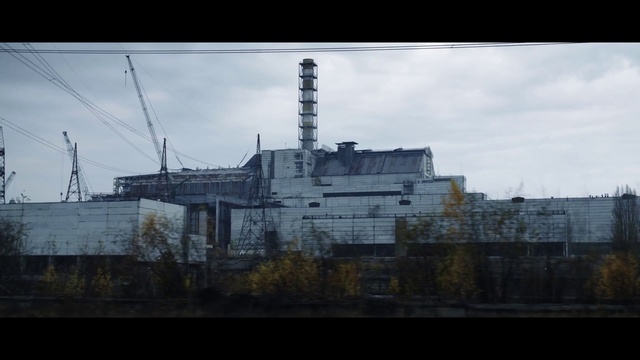 Video Reference N0: Architecture, Sky, Industry, Building, Factory, Screenshot, City, Electricity, Outdoor, Train, Large, View, Light, Bridge, Track, Traveling, Street, Water, Cloudy, Standing, Snow, River, Tall, White, Traffic, Riding, Boat, Field, Sign, Rain, Man, Cloud, Tower, Skyscraper, Abandoned, Day