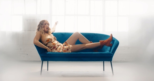 Video Reference N3: Furniture, Blue, Leg, Couch, Beauty, Studio couch, Sitting, Turquoise, Chaise longue, Water, Indoor, Woman, Table, Looking, Girl, Room, Green, Young, Living, White, Large, Laying, Red, Cat, Wall, Nude, Bathtub, Vessel, Chair, Bed