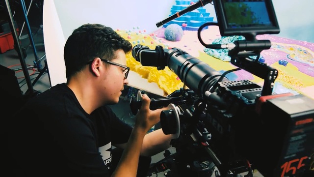 Video Reference N4: Camera operator, Cinematographer, Filmmaking, Videographer, Cameras & optics, Film crew, Photography, Video camera, Camera, Film producer, Person