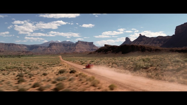 Video Reference N8: Mountainous landforms, Nature, Sky, Natural landscape, Wilderness, Dirt road, Mountain, Badlands, Natural environment, Cloud