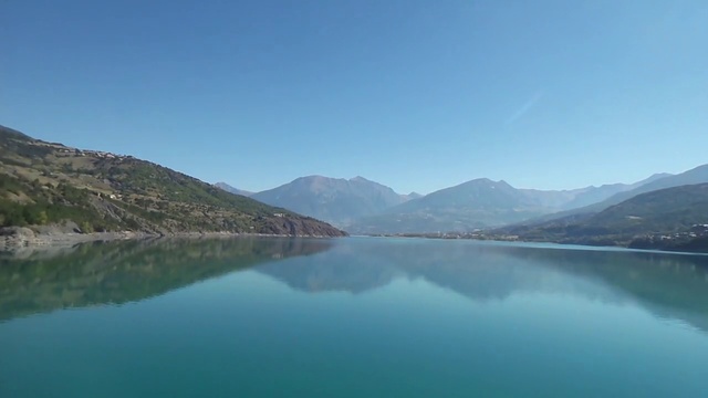 Video Reference N11: Body of water, Highland, Nature, Lake, Water resources, Mountainous landforms, Mountain, Sky, Reservoir, Water