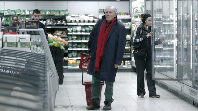 Video Reference N1: supermarket, outerwear, suit, technology, retail, product, building, vehicle, Person
