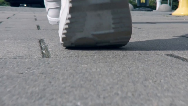 Video Reference N2: Automotive tire, Tire, Asphalt, Automotive wheel system, Wheel, Road surface, Auto part, Floor, Concrete, Roof