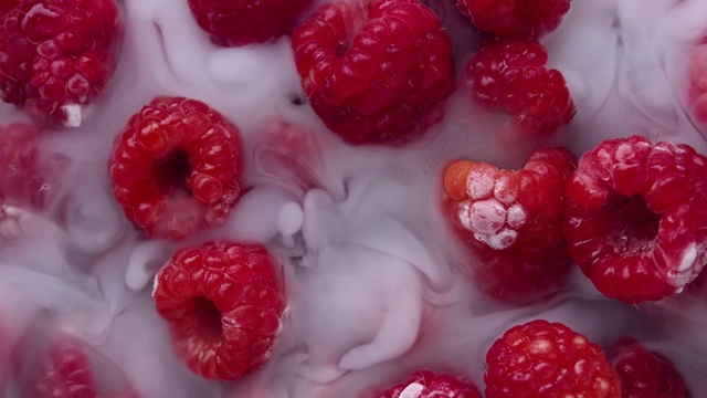Video Reference N1: Food, Natural foods, Raspberry, Berry, Fruit, Frutti di bosco, Strawberries, Superfruit, Strawberry, Plant, Person, Cake, Paper, Plate, Table, Covered, Doughnut, Holding, Plastic, Piece, Topped, Red, Small, Snow, Decorated, Ready, Hand, Filled, White, Birthday, Clear, Alpine strawberry, Dessert, Candy, Sweet, Tayberry, Boysenberry, Virginia strawberry, Seedless fruit, Accessory fruit, Wine raspberry, Strawberry pie, Sweetness, Blackberry, Superfood, Birthday cake, Blueberry, Grape, Cherry, Fresh