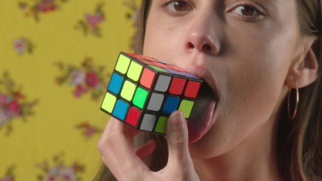 Video Reference N2: Rubiks cube, Toy, Puzzle, Cheek, Mechanical puzzle, Play, Hand, Finger, Colorfulness, Nail
