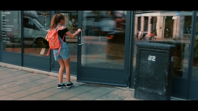Video Reference N0: blue, infrastructure, girl, standing, snapshot, street, photography, urban area, road, fun, Person