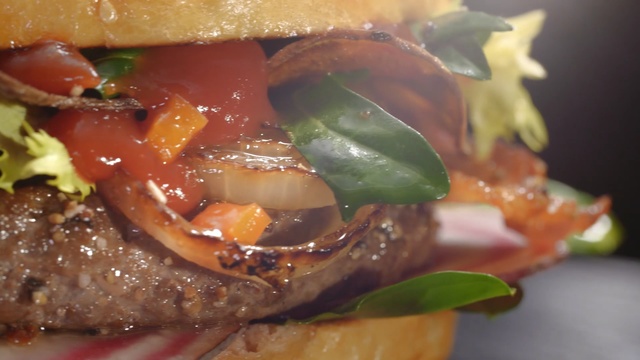 Video Reference N8: hamburger, dish, sandwich, appetizer, veggie burger, cheeseburger, food, buffalo burger, finger food, pan bagnat